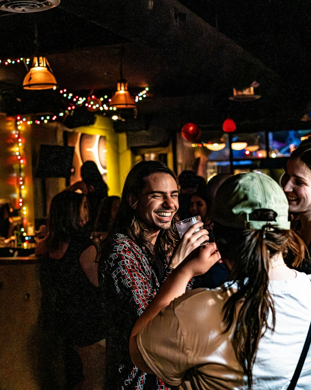 Television production team celebrating together in a studio
